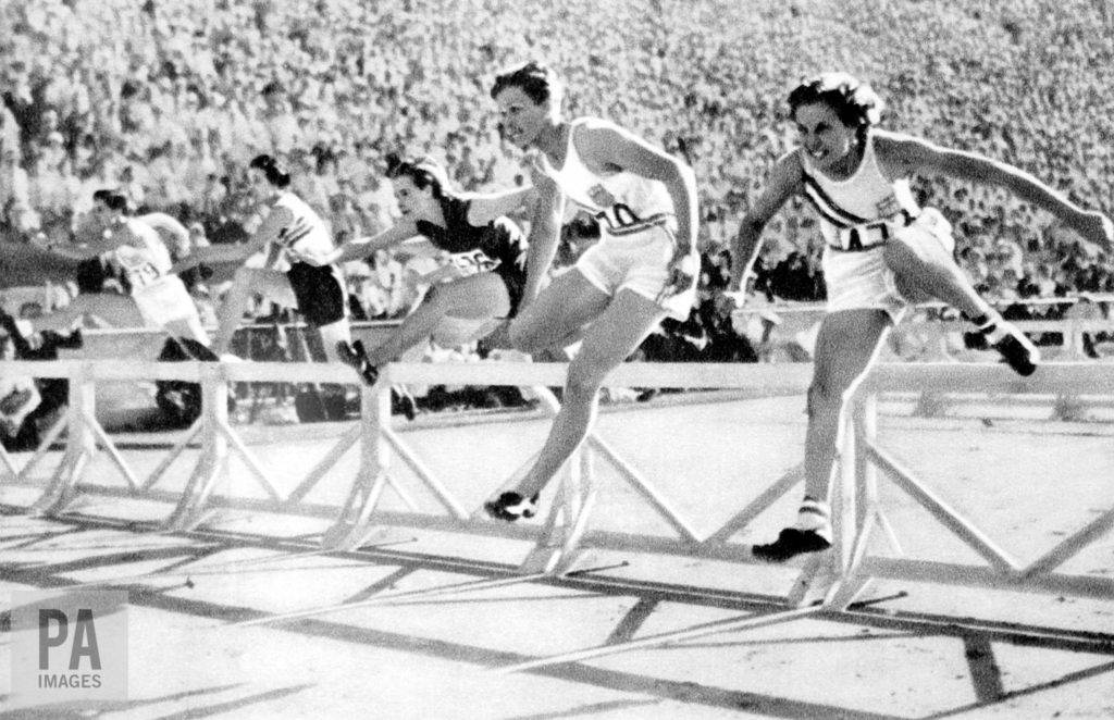 USA's gold medallist Mildred 'Babe' Didrikson (second from right) leads off the last hurdle, followed by teammate Evelyne Hall