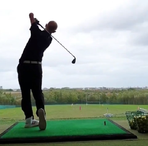 Darren Grey practising at the Ingleby Barwick Golf Academy Driving Range