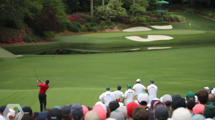Tiger Woods (USA) plays a shot on the 12th hole during the final round of the 2019 Masters golf tournament at the Augusta National Golf Club