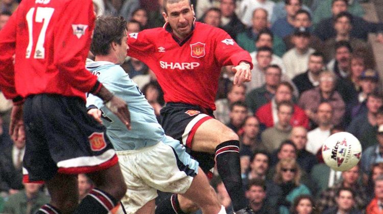 An action shot of Eric Cantona