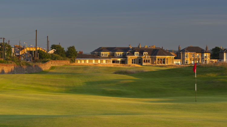 A view of the famous opening hole (Railway) with the clubhouse in the background - Photo Credit Mark Alexander, by kind permission of Prestwick Golf Club