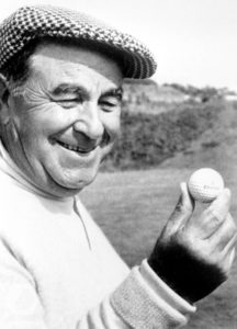 A photo of Gene Sarazen admiring the ball with which he holed out in one at the Postage Stamp, Royal Troon in the 1973 Open Championship (aged 71)