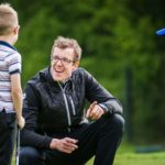 A photo of Thomas Devine engaging with Junior Golfers on the FUEL Junior Golf Programme