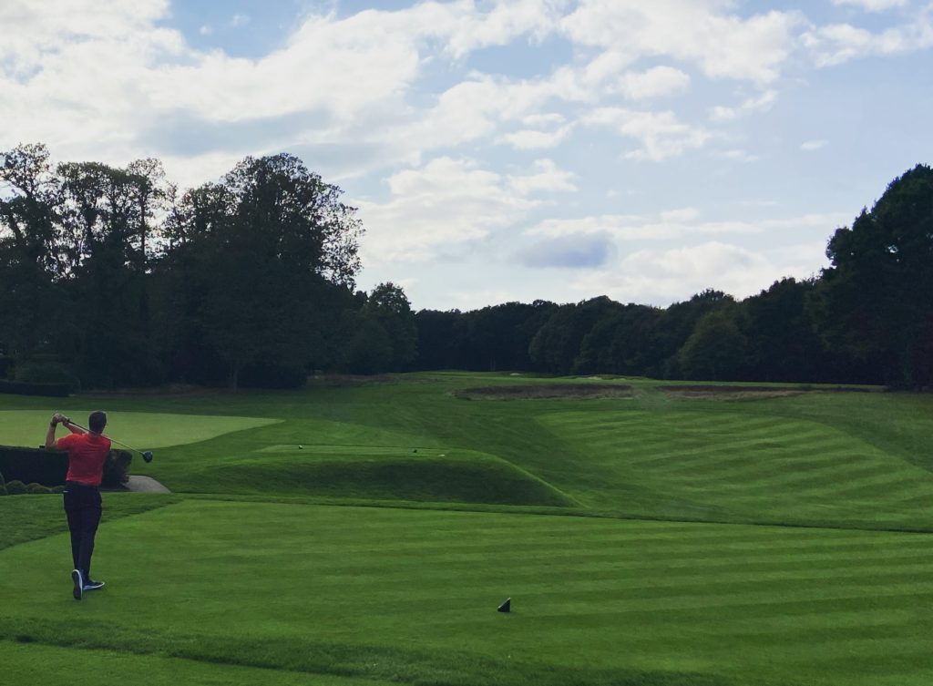 A photo of Thomas 'teeing off' on the West Course, Wentworth