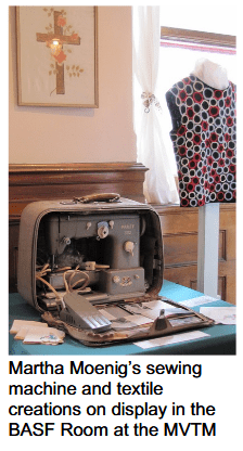 A photograph of Martha Moenig's sewing machine and textile creations, by kind permission of the Mississippi Valley Textile Museum