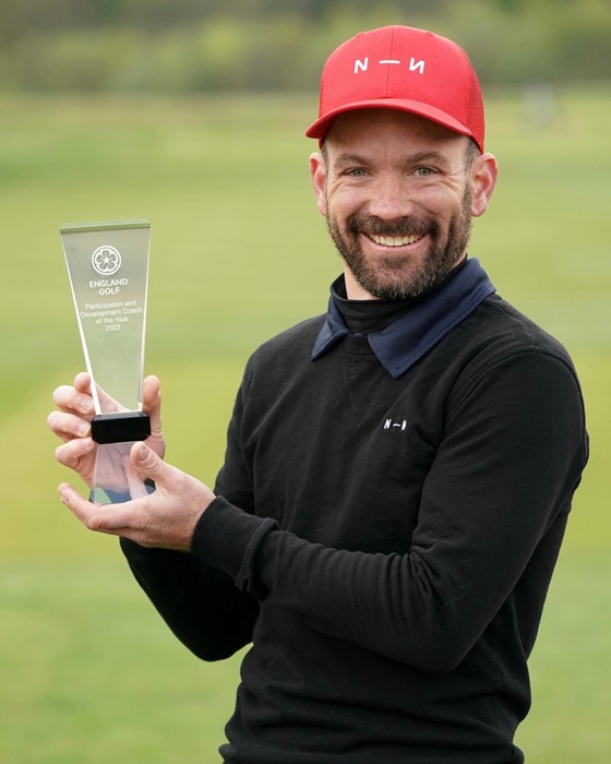 Aaron Cox proudly displaying the trophy he was awarded when named England Golf Participation & Development Coach of the Year in 2022 ... photograph by kind permission of Aaron Cox.